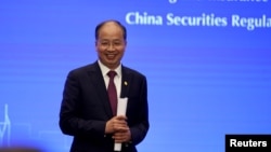 资料照片:时任中国证监会主席易会满在上海出席陆家嘴金融论坛。(2019年6月13日)