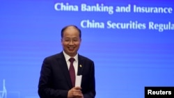 资料照:时任中国证监会主席易会满在上海出席陆家嘴金融论坛。(2019年6月13日)