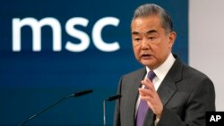 Chinese Foreign Minister Wang Yi delivers a speech at the Munich Security Conference at the Bayerischer Hof Hotel in Munich, Germany, Feb. 17, 2024.