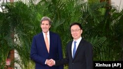中国国家副主席韩正在北京会晤到访的美国气候特使克里。(2023年7月19日)