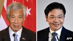 资料照:新加坡总理李显龙(左),新加坡副总理兼财政部长黄循财