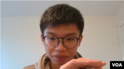 已经解散的香港学生组织“学生动源”前召集人钟翰林在英国时间12月27日晚上到达伦敦并接受美国之音访问 (美国之音郑乐捷)