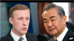 美国国家安全顾问杰克·沙利文(Jake Sullivan)(左)和中国外交部长王毅。