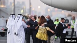 Siamak Namazi and Morad Tahbaz, who were released during a prisoner swap deal between U.S. and Iran, arrive at Doha International Airport, Qatar, Sept. 18, 2023.