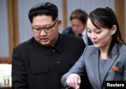 资料照:朝鲜领导人金正恩和他的妹妹金与正