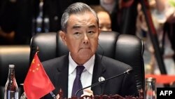 资料照片:2024年7月27日,中国外长王毅在老挝万象出席东盟外长会议。(法新社照片)