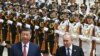 Президент Росії Володимир Путін і президент Китаю Сі Цзіньпін на офіційній церемонії зустрічі перед Народним залом на площі Тяньаньмень у Пекіні, 16 травня 2024 року. (Сергій Бобильов/Sputnik/viaAFP)
