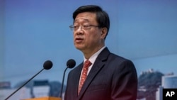 资料照片:香港特首李家超在香港举行的一次记者会上讲话。(2023年3月21日)