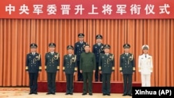 中共中央军委主席习近平晋升新任火箭军司令员王厚斌(左上)与火箭军政委徐西盛(右上)兩人为上將。(2023年7月31日)