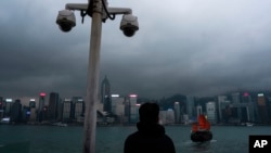 资料照:从香港尖沙咀遥望香港岛(2024年3月11日)