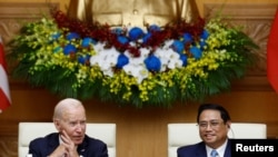 美国总统拜登2023年9月11日在河内会见越南总理范明政。(资料照)