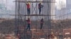 资料照:中国河北雄安一处建筑工地的工人在施工(2024年3月14日)