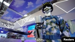 资料照:中国珠海国际空展上展示的CH-817 小型攻击无人机。(2021年9月29日)