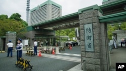 资料照:日本防卫省大门