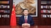 中共官媒新华社发布照片显示,中国领导人习近平在北京发表新年贺词(2023年12月31日)