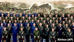 中国领导人习近平在全国人大会议期出席解放军和武警部队代表团全体会议。(2023年3月8日)