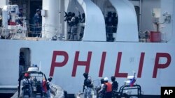 菲律宾、美国和日本的海岸警卫队在菲律宾海岸外举行海岸防卫联合演习。(美联社2023年6月6日)