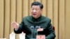 资料照片:中国领导人习近平在全国人大会议期间在解放军和武警部队代表团全体会议上讲话。(2023年3月8日)