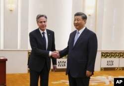 中国领导人习近平在北京人大会堂会晤到访的美国国务卿布林肯。(2019年6月19日)