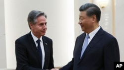 中国领导人习近平在北京人大会堂会晤到访的美国国务卿布林肯。(2023年6月19日)