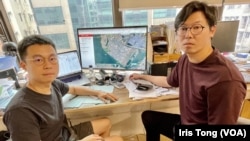 本土研究社成员陈剑青(右)及黄肇鸿表示,他们研究国际间13个类似香港交椅洲人工岛面积、超过1千公顷的大型填海工程,当中接近8成“烂尾” (美国之音/汤惠芸)