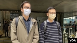 资料照片:被控串谋发布煽动刊物的香港网络媒体《立场新闻》前总编辑钟沛权(左)和前署理总编辑林绍桐