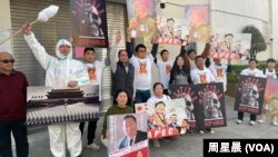 抗议人士下车,围绕中国驻旧金山总领事馆游行抗议。(周星晨)