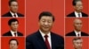 中共二十大闭幕后,新一届中共中央政治局7名常委在人民大会堂与媒体见面。中间大幅照片是习近平。左列上至下:李强、王沪宁、丁薛祥。右列上至下:赵乐际、蔡奇、李希。(2022年10月23日)