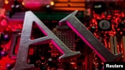 路透社资料照:插图显示 AI(人工智能)字母和计算机主板