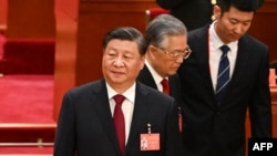 中共领导人习近平和前领导人胡锦涛在北京人大会堂出席中共二十大开幕式。(2022年10月16日)