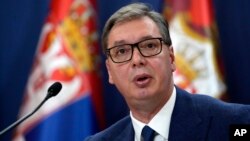FILE - Serbian President Aleksandar Vucic addresses the nation at a news conference in Belgrade, Serbia, Aug. 21, 2022.