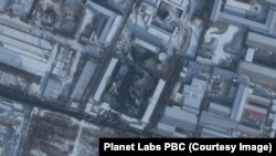 2022年12月27日,卫星图片显示在沈阳市殡仪馆外排长龙的车辆(来源:Planet Labs PBC)