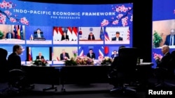 资料照片:美国总统拜登与其他12个创始成员国领导人在“印太经济框架”启动仪式上。(2022年5月23日)
