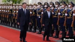 中国国家主席习近平2023年1月4日为到访的菲律宾总统小马科斯举行欢迎仪式。(路透社转发)