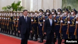中国国家主席习近平2023年1月4日为到访的菲律宾总统小马科斯举行欢迎仪式。(路透社转发)