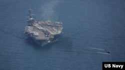 资料照片:美国海军尼米兹级核动力航空母舰“林肯”号行驶在日本海。