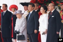 2015年10月20日, 英国女王伊丽莎白二世和菲利普亲王,英国首相卡梅伦和内政大臣特蕾莎·梅欢迎中国主席习近平和夫人彭丽媛对英国进行国事访问