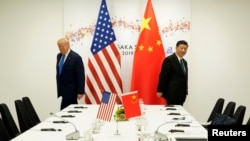 资料照:美国总统特朗普与中国国家主席习近平2019年6月29日在大阪。