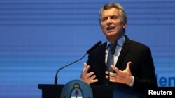 Argentina's President Mauricio Macri gestures as he speaks during a ceremony to announce economic measures at the Kirchner Cultural Center in Buenos Aires, Argentina, Oct. 30, 2017.