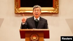 陈建仁在台湾总统府的记者会上接任台湾行政院长后发表讲话。(2023年1月27日)