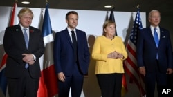 美国总统拜登、德国总理默克尔、法国总统马克龙和英国首相约翰逊在罗马出席20国集团峰会(2021年10月30日)