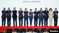 Foreign Ministers of the Association of Southeast Asian Nations pose for group photos during the 32nd ASEAN Coordinating Council meeting at the ASEAN Secretariat in Jakarta, Indonesia, February 3, 2023.