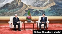 2月10日,中共中央政治局常委王沪宁在北京会见中国国民党副主席夏立言一行。 (新华社照片)