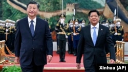 资料照:中国领导人习近平在北京人大会堂欢迎到访的菲律宾总统小马科斯。(2023年1月4日)