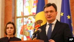 Президентка Молдови Мая Санду та колишній міністр внутрішніх справ Молдови Дорін Речан