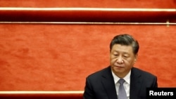 中国领导人习近平在北京人大会堂举行的全国政协十三届五次会议开幕式上。(2022年3月4日)
