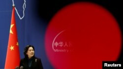 资料照:2022年2月24日,中国外交部发言人华春莹在北京举行的一个新闻发布会上(路透社)。
