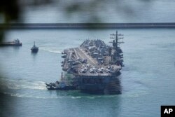 美国海军罗纳德·里根号航母进入韩国釜山海军基地(2022年9月23日)