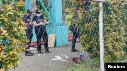 马尼拉警察在一处犯罪现场调查(资料照,2022年7月24日)