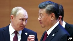 资料照:中国领导人习近平与俄罗斯总统普京在乌兹别克斯坦会面。(2022年9月16日)